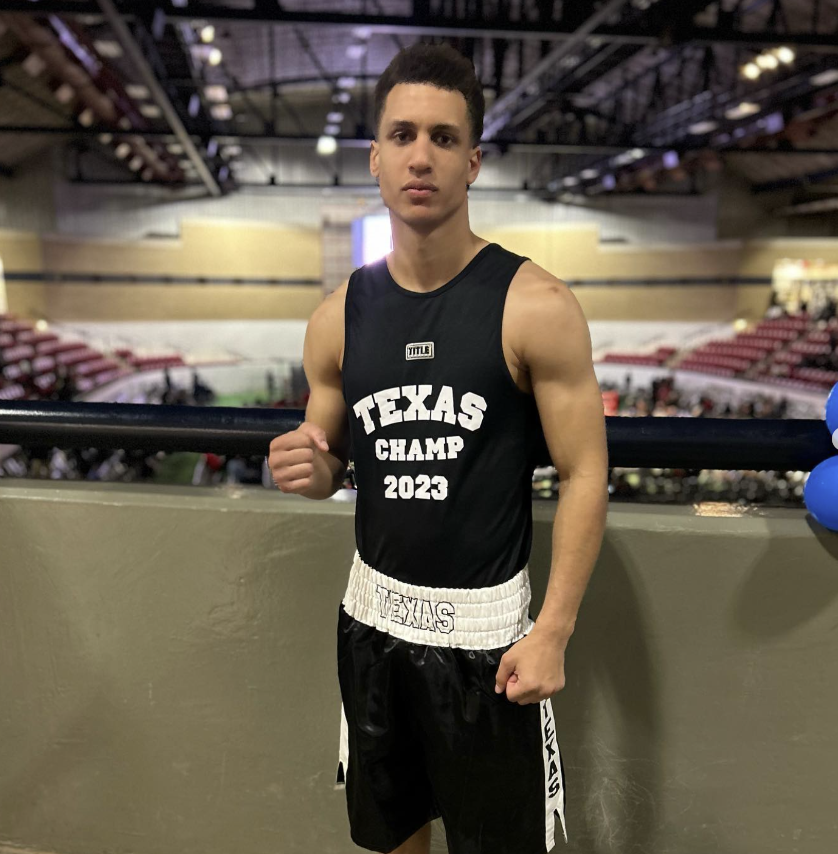 David Kasindi Kongo wearing Texas Champ 2023 jersey after winning Golden Gloves Championship