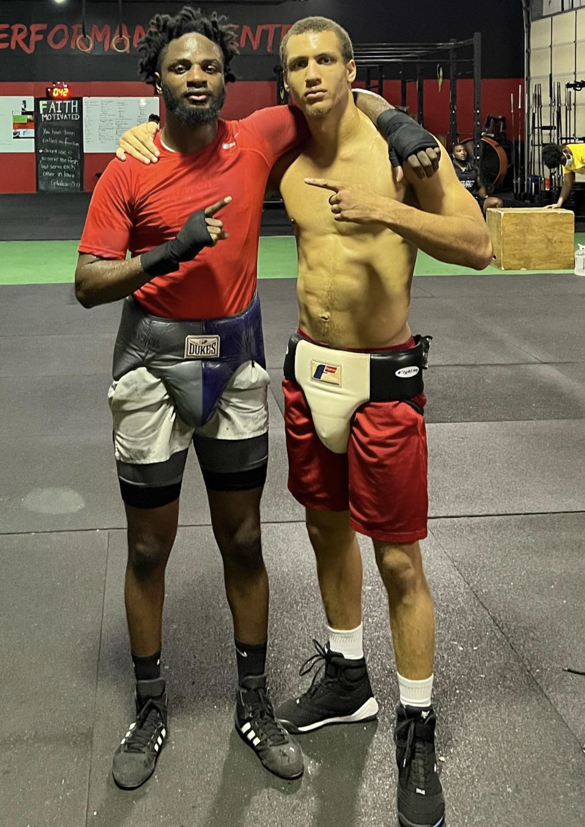 David Kasindi Kongo after sparring session at performance center showing fighter physique